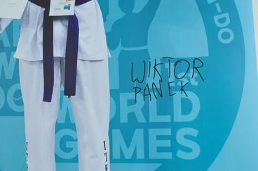 Wiktor Panek ze złotym medalem Światowych Igrzysk Taekwon-do ITF w Seulu - szkoła w Dzietrznikach powitała mistrza